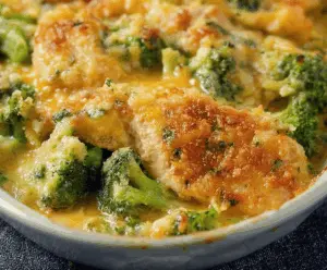 Creamy Broccoli Cheddar Chicken dish inspired by Cracker Barrel, featuring tender chicken, fresh broccoli, and melted cheddar cheese.