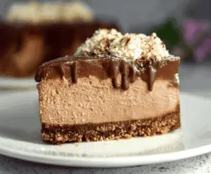 Decadent No-Bake Triple Chocolate Mascarpone Cheesecake with rich layers of chocolate and creamy mascarpone filling.