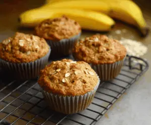 Delicious homemade No-Fuss Banana Oat Muffins on a baking tray, perfect for a healthy breakfast or snack