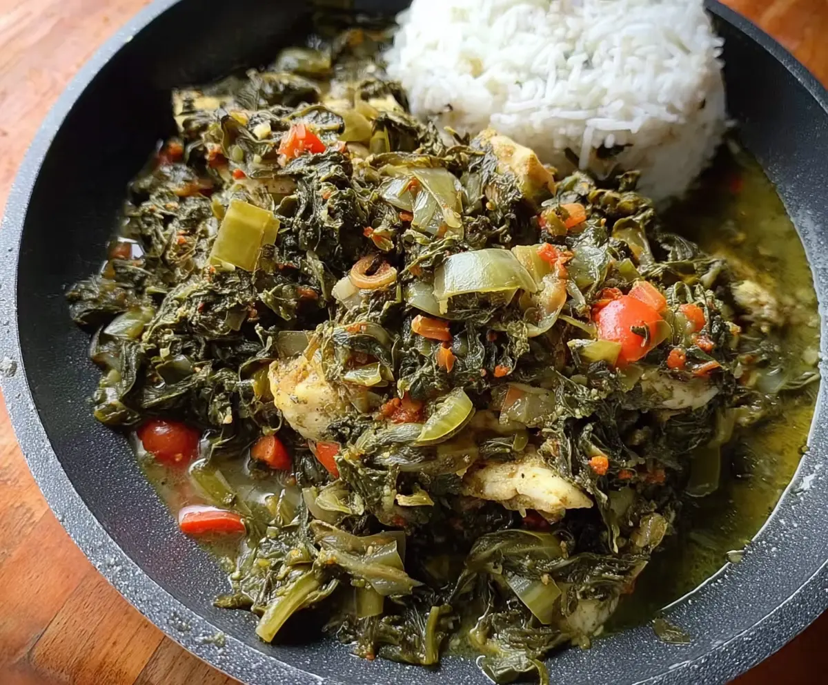 Delicious callaloo and saltfish dish served with traditional Caribbean flavors.